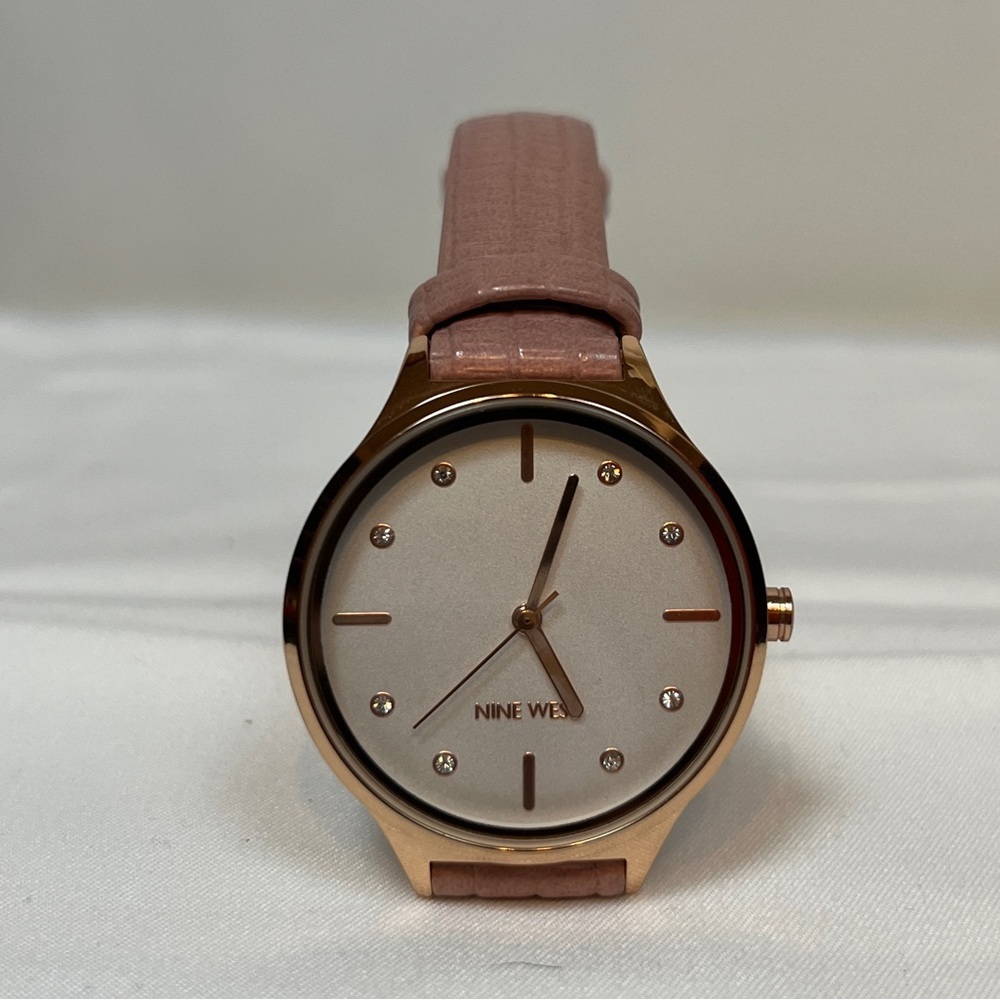 COPY - NWOT. Woman’s Nine West Gold Tone Watch with Pink Strap
